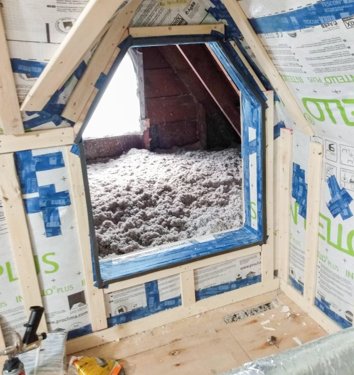Photo showing cellulose insulation in attic