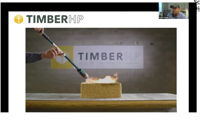 photo showing torch being used on wood fiber insulation