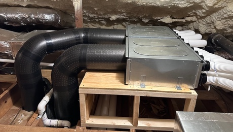Zehnder ERV installation blitz: Ducts from ERV in basement connect to the two manifolds, which connect to the tubes going to the individual vents