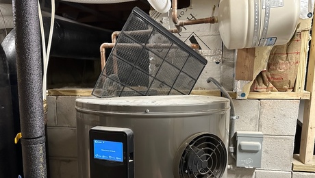 A heat pump water heater has a filter