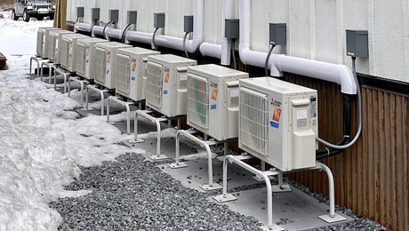 Nine individual one-to-one mini-split heat pump outdoor units [Photo courtesy of Jonah Richard]